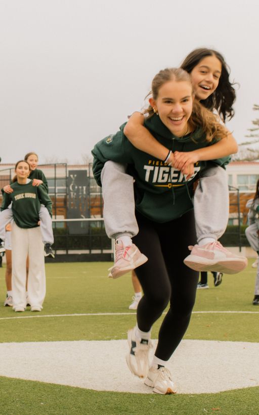 YHS senior students being piggybacked