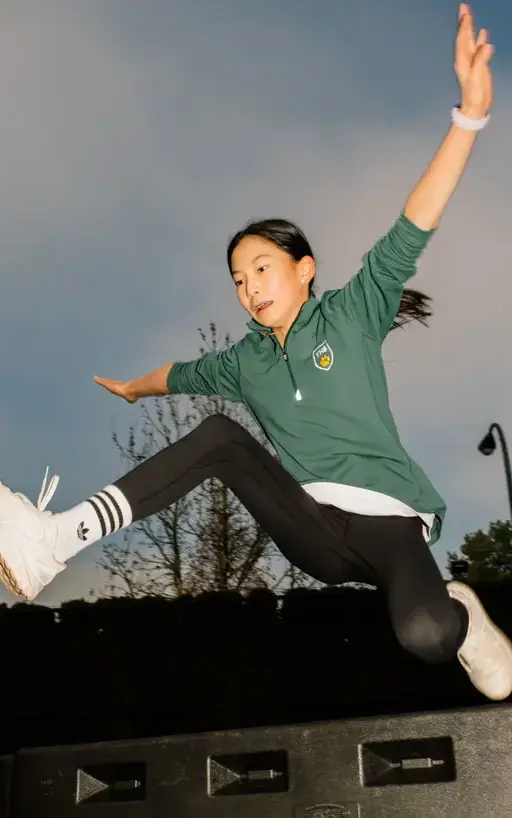School pupil jumping 